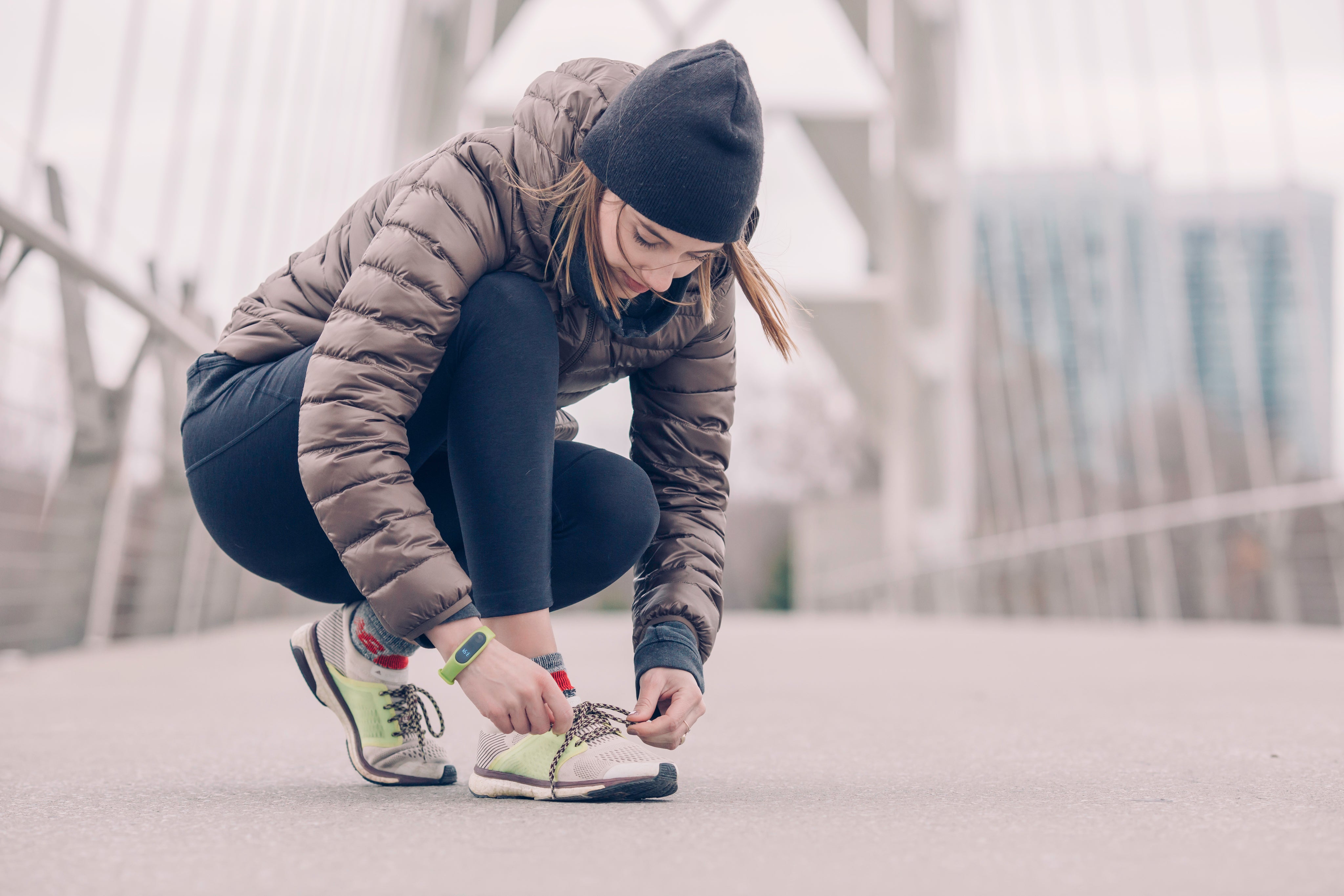 files/woman-athlete-tying-shoes.jpg